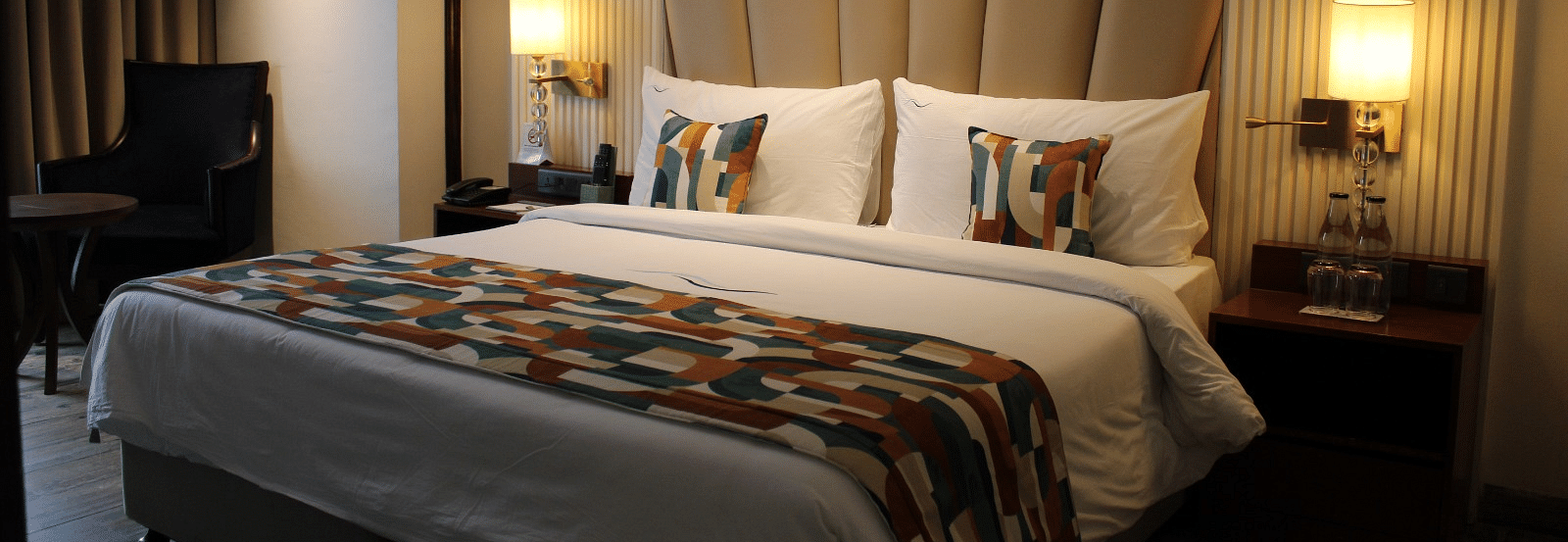 A bedroom featuring a functional working space for productivity at BluSalzz Residence, Amritsar
